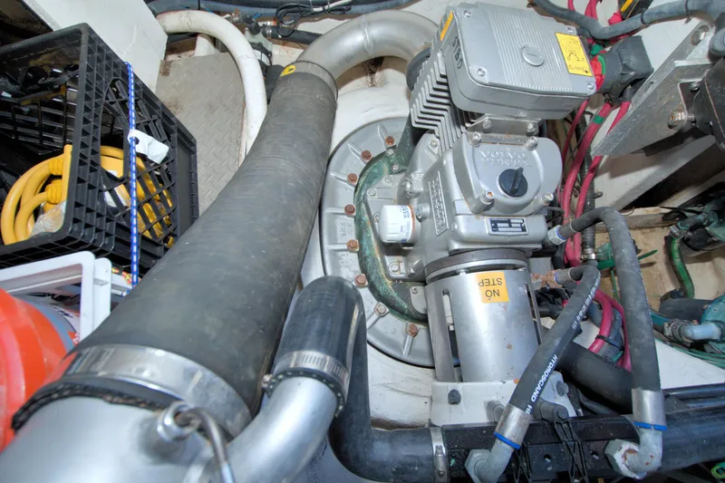 Slide: The Image of Engine room of 2014 Regal 46 Sport Coupe with mechanical components and wiring. - 83