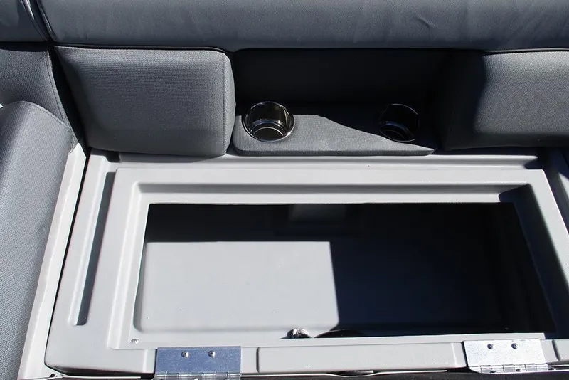 Slide: The Image of 2026 Bentley Pontoons Legacy 243 Swingback storage compartment with cup holders. - 12