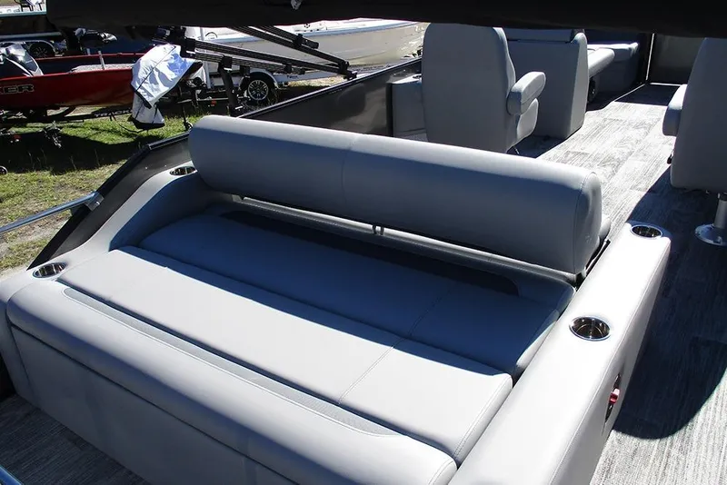 Slide: The Image of 2026 Bentley Pontoons Legacy 243 Swingback interior with luxurious seating and modern design. - 16