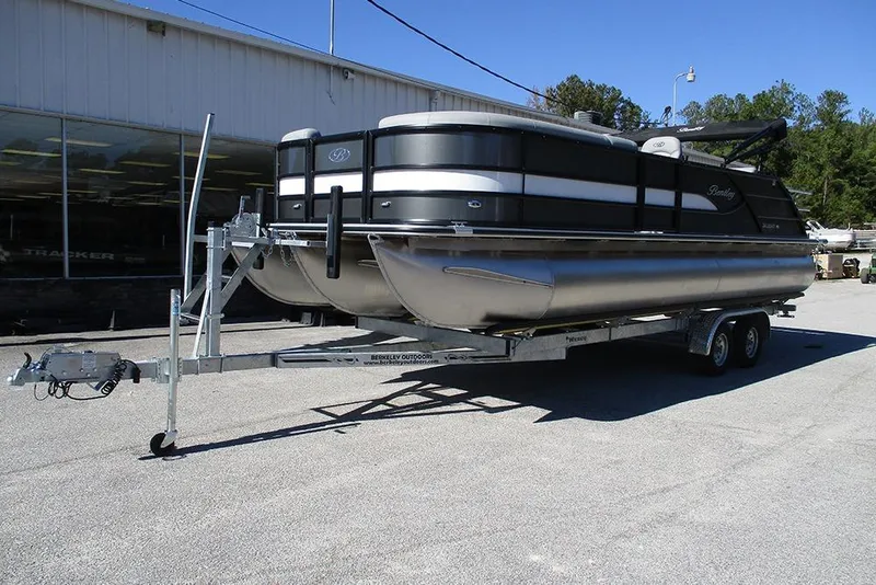 Slide: The Image of 2026 Bentley Pontoons Legacy 243 Swingback on trailer outside dealership. - 3