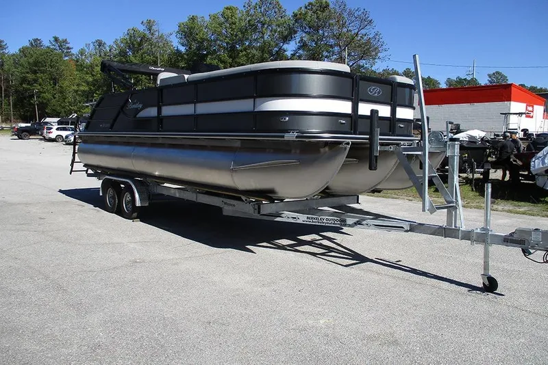 Slide: The Image of 2026 Bentley Pontoons Legacy 243 Swingback on trailer in outdoor setting. - 5