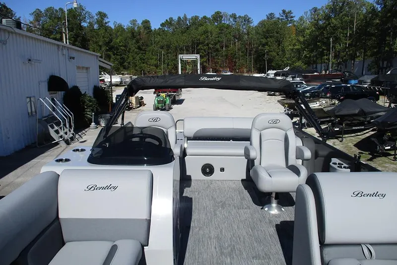 Slide: The Image of 2026 Bentley Pontoons Legacy 243 Swingback with luxurious seating and sleek design. - 8