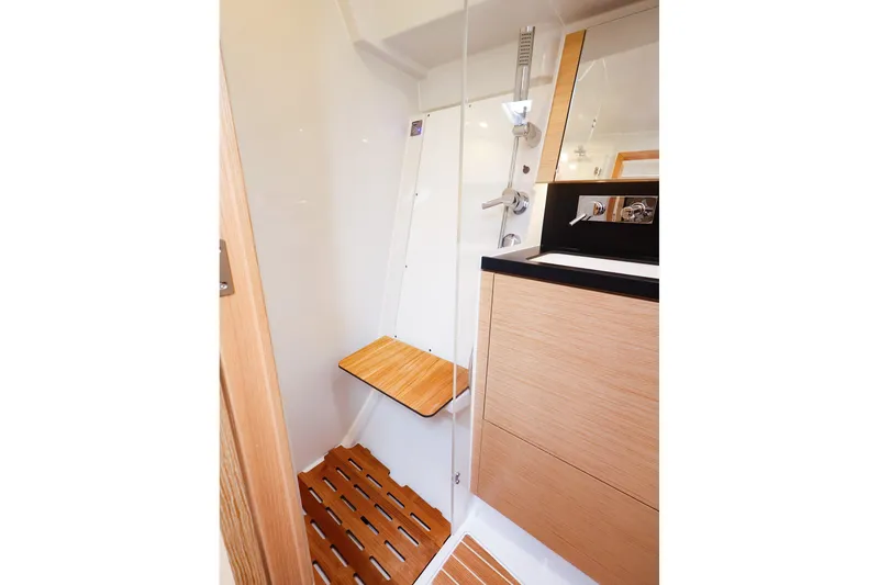 Slide: The Image of Modern bathroom interior of 2025 Hanse 410 yacht with wooden accents and sleek fixtures. - 15
