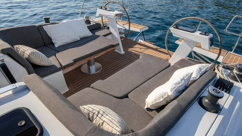 Slide: The Image of Luxurious seating area on 2025 Hanse 410 yacht with ocean view. - 8