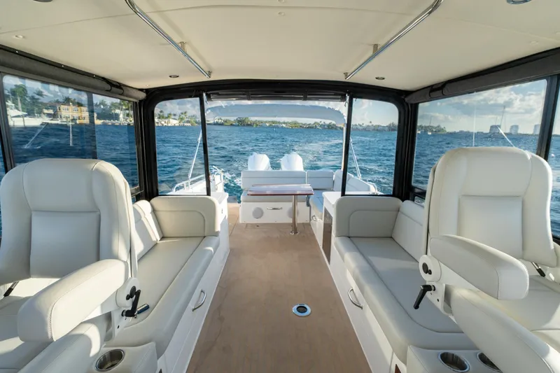 Slide: The Image of Interior of 2026 MJM 3 boat with luxurious seating and ocean view. - 3