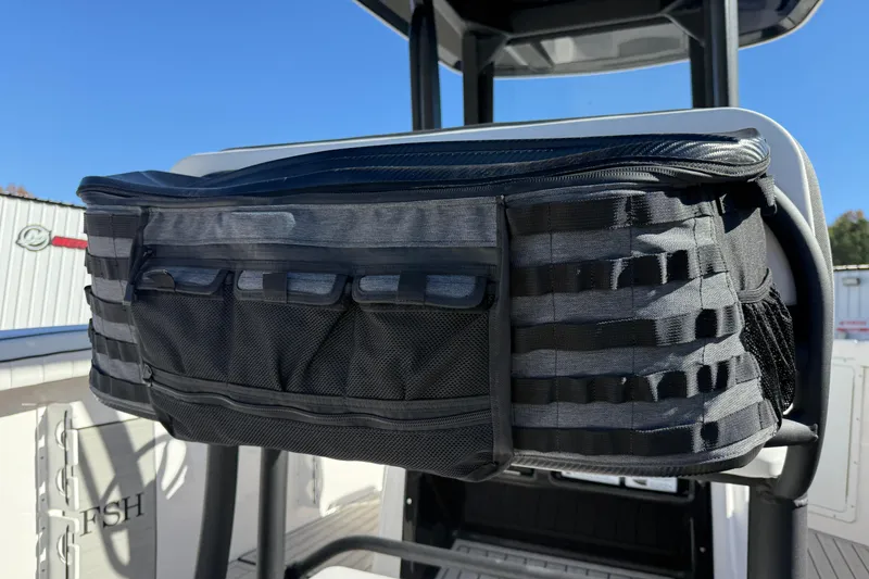 Slide: The Image of Storage compartment on 2024 Yamaha Boats 255 FSH Sport H, featuring mesh pockets and durable design. - 11