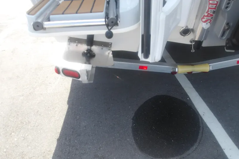 Slide: The Image of Rear view of 2026 Ranger 2510 Bay boat on trailer in parking lot. - 8