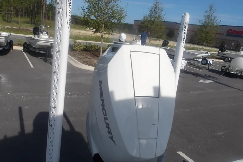 Slide: The Image of 2026 Ranger 2510 Bay boat with Mercury engine in parking lot. - 35