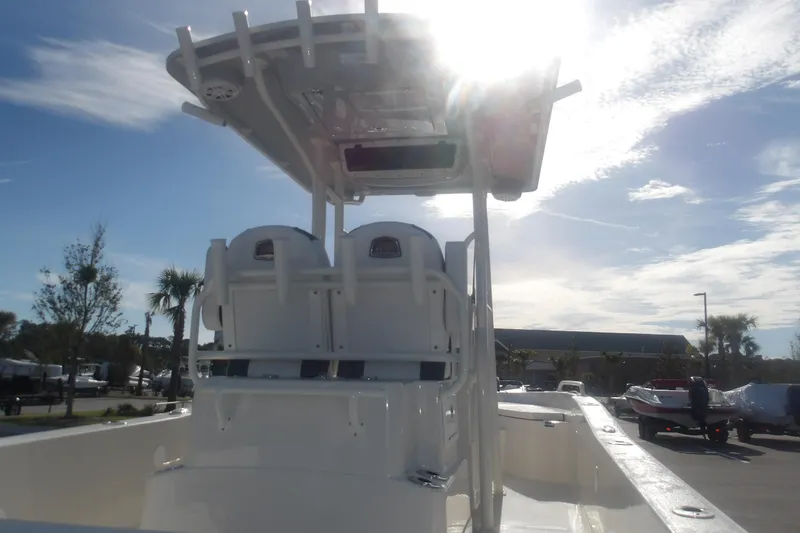 Slide: The Image of 2026 Ranger 2510 Bay boat with T-top under bright sky. - 16