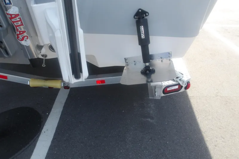 Slide: The Image of Rear view of 2026 Ranger 2510 Bay boat with trim tab and trailer. - 10