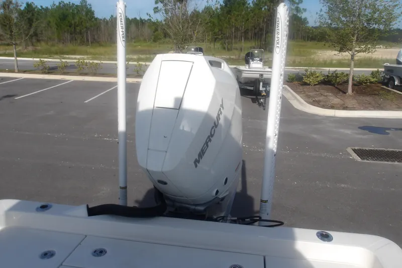 Slide: The Image of 2026 Ranger 2510 Bay boat with Mercury engine in parking lot. - 33