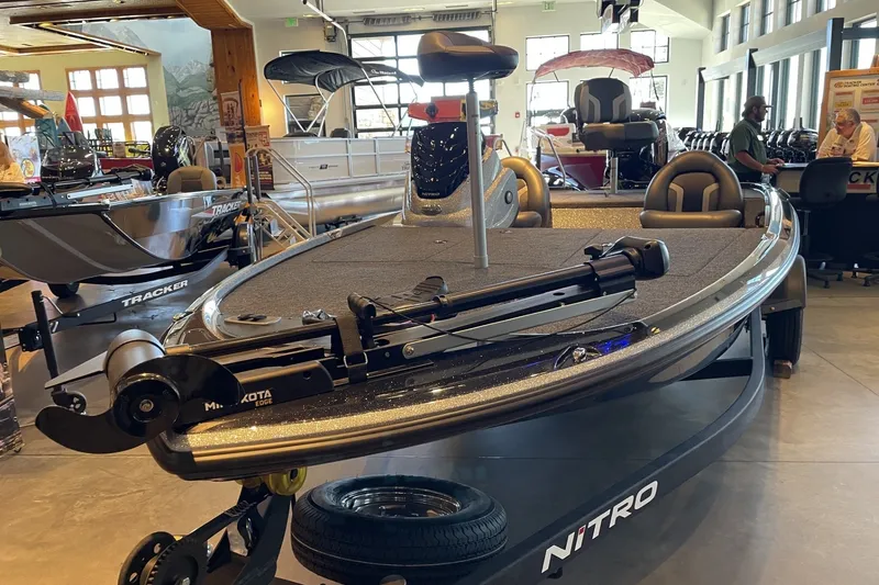 Slide: The Image of 2026 Nitro Z17 boat displayed in showroom, featuring sleek design and advanced features. - 2