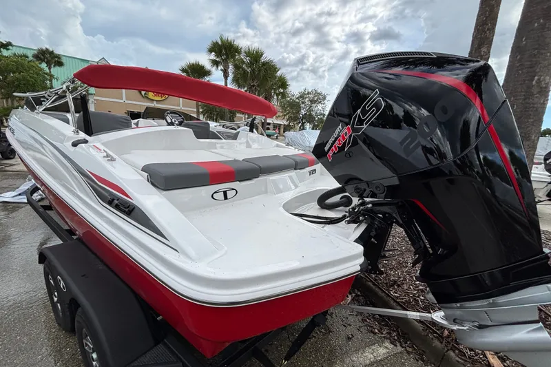 Slide: The Image of 2026 Tahoe T21 boat with red accents and powerful Mercury Pro XS engine. - 4
