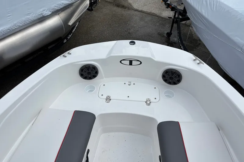 Slide: The Image of 2026 Tahoe T21 boat interior with seating, speakers, and storage compartments. - 7