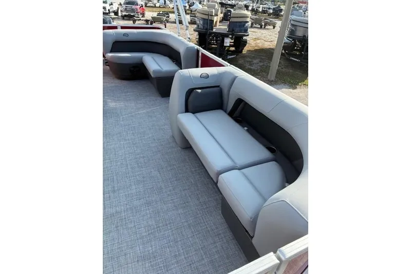 Slide: The Image of 2026 Sun Tracker Party Barge 18 DLX interior with spacious seating and modern design. - 4