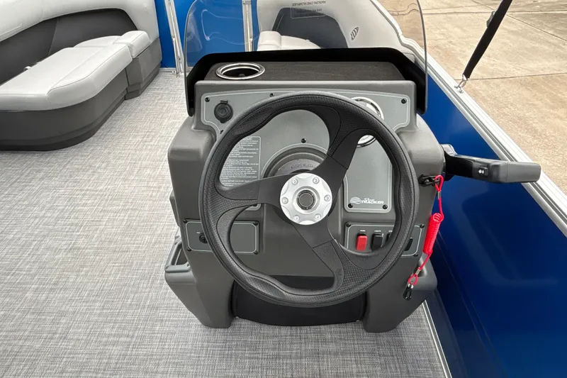 Slide: The Image of Steering console of 2026 Sun Tracker Party Barge 16 DLX pontoon boat. - 16