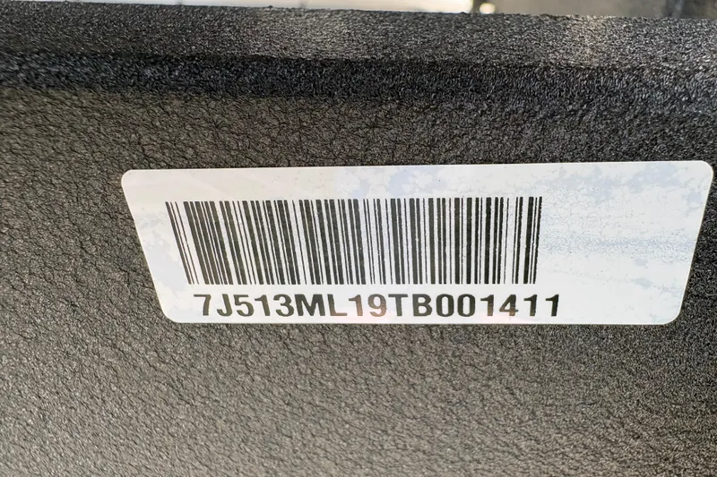 Slide: The Image of Barcode and serial number on 2026 Sun Tracker Bass Buggy 18 DLX. - 105