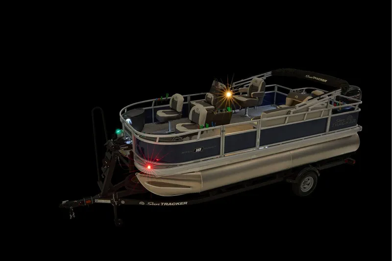 Slide: The Image of 2026 Sun Tracker Bass Buggy 18 DLX interior with seating and fishing station. - 25