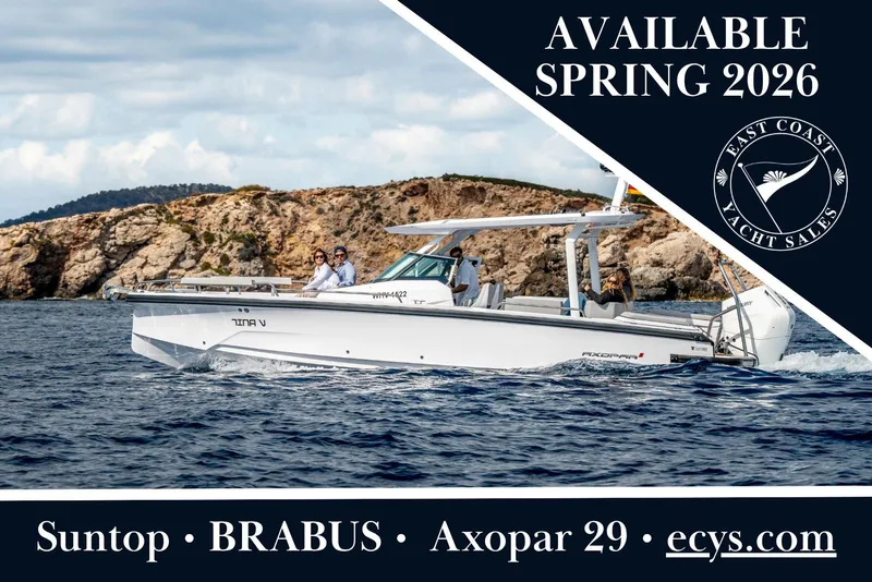 The Image of 2026 Axopar 29 Sun Top yacht cruising near rocky coastline, available spring 2026. - 0