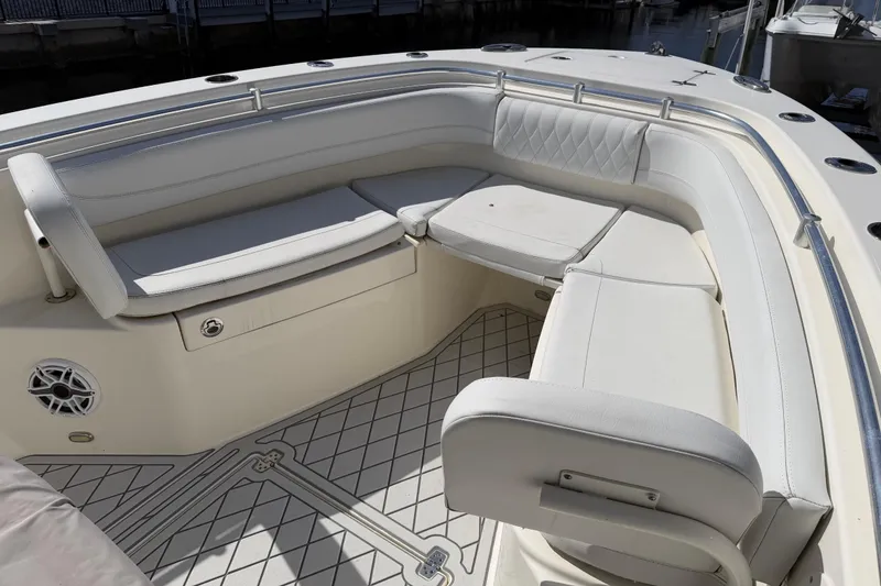Slide: The Image of 2021 Cobia 262 Center Console boat with spacious seating and elegant design. - 15