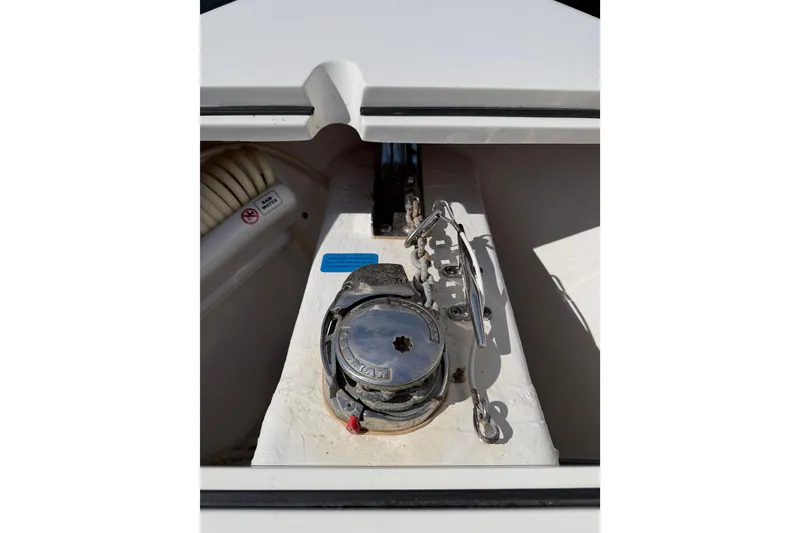 Slide: The Image of Anchor winch on 2021 Cobia 262 Center Console boat. - 19
