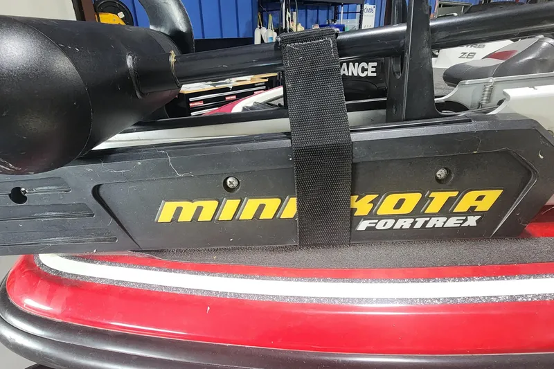 Slide: The Image of Minn Kota Fortrex motor on 2011 Nitro Z-8 boat, secured with a strap. - 4