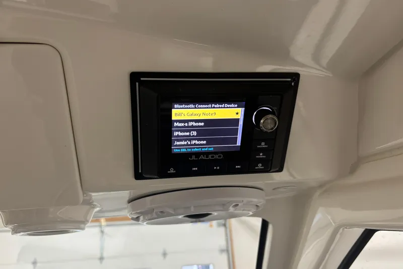 Slide: The Image of JL Audio system in 2020 Pursuit DC 365 Dual Console with Bluetooth device list. - 34