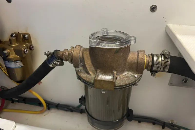 Slide: The Image of Fuel filter system on a 2020 Pursuit DC 365 Dual Console boat. - 48