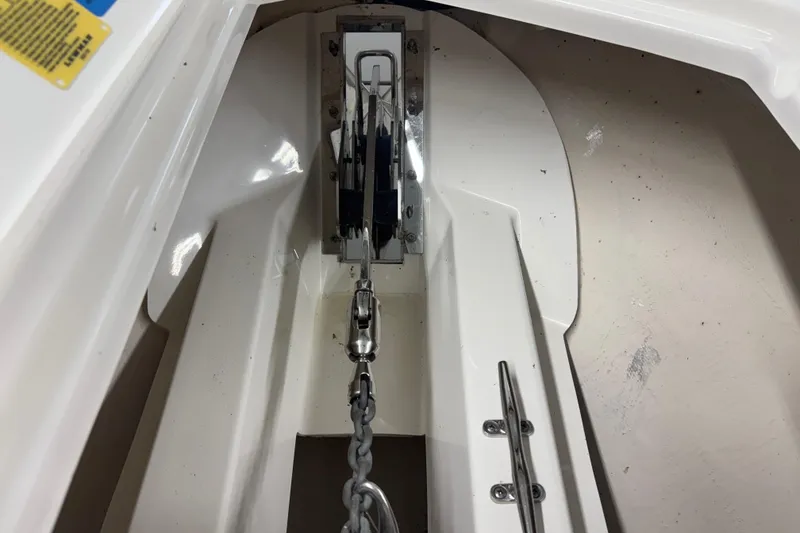 Slide: The Image of Anchor chain mechanism on a 2020 Pursuit DC 365 Dual Console boat. - 53
