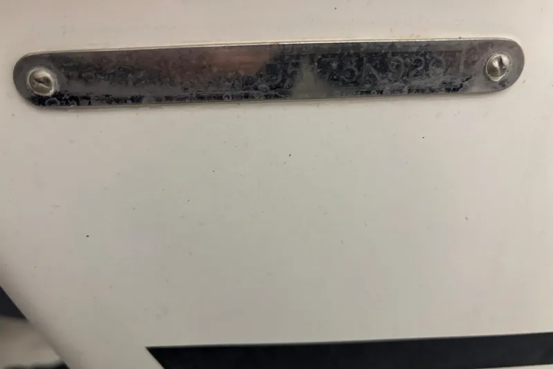 Slide: The Image of 2020 Pursuit DC 365 Dual Console boat identification plate, close-up view. - 55