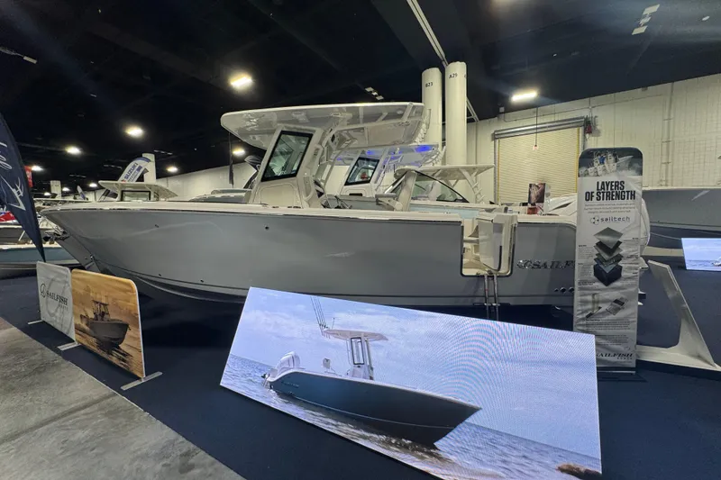 The Image of 2026 Sailfish 272 CC boat displayed at an indoor exhibition, showcasing its sleek design. - 0