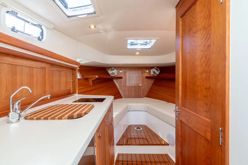 Slide: The Image of Luxurious interior of 2025 MJM 35 yacht with wood finishes and modern amenities. - 39