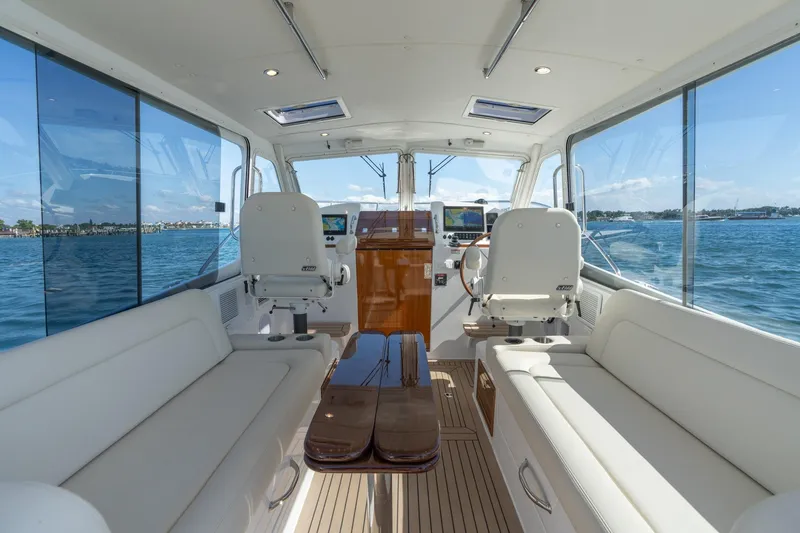 Slide: The Image of Interior of 2025 MJM 35 yacht with luxurious seating and panoramic windows. - 4