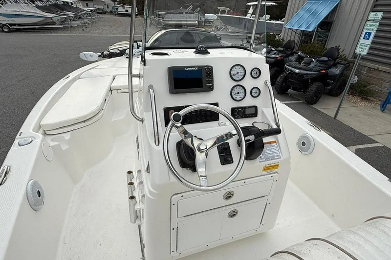 Slide: The Image of 2015 Sea Fox 200 Viper boat interior with steering console and gauges. - 13