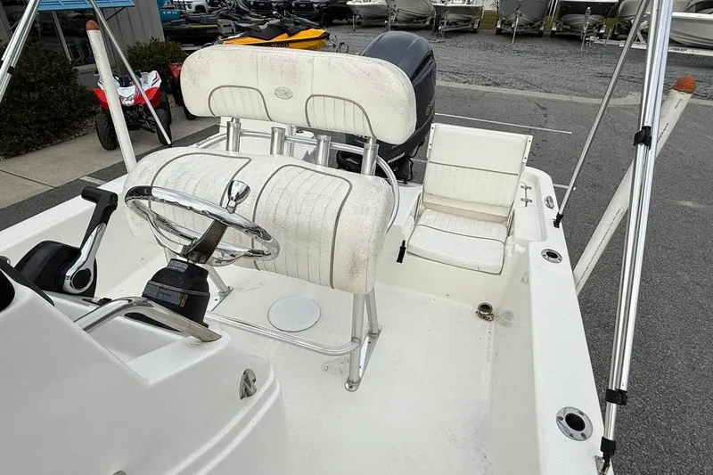 Slide: The Image of 2015 Sea Fox 200 Viper boat interior with steering wheel and seating. - 15
