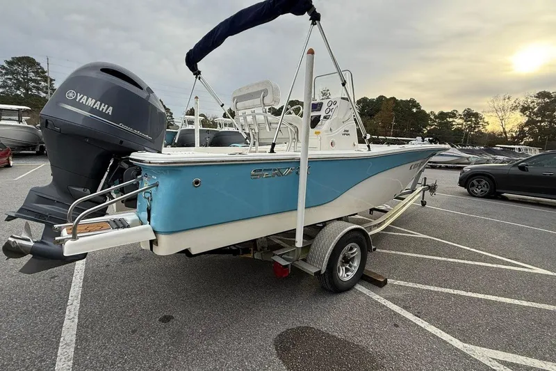 Slide: The Image of 2015 Sea Fox 200 Viper boat on trailer with Yamaha outboard motor in parking lot. - 3