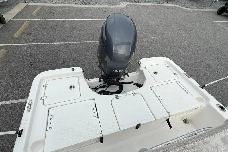 Slide: The Image of 2015 Sea Fox 200 Viper boat with 150 horsepower outboard motor in parking lot. - 9