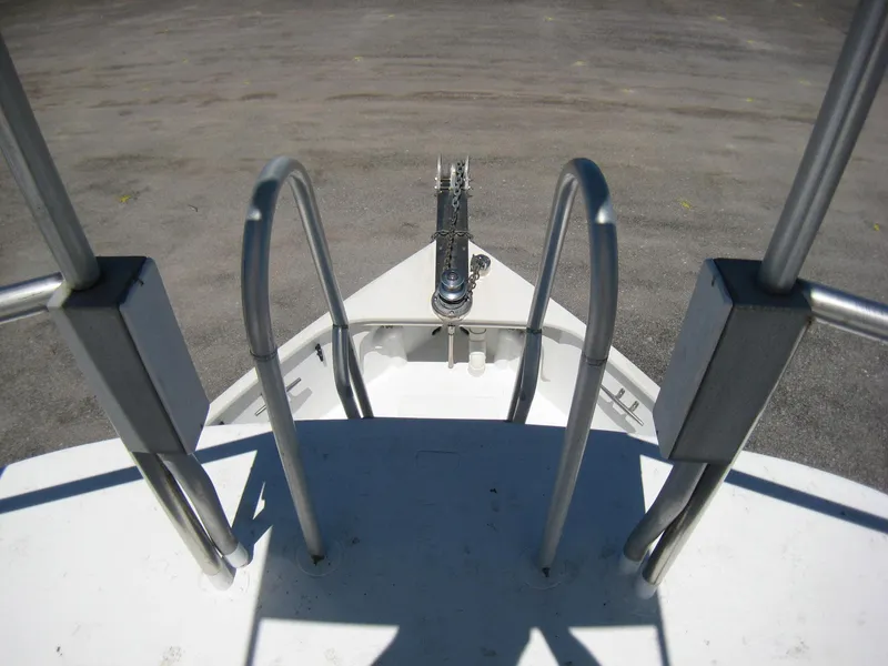 Slide: The Image of Bow view of 1987 Custom Pilgrim Tribute boat with metal railings. - 33