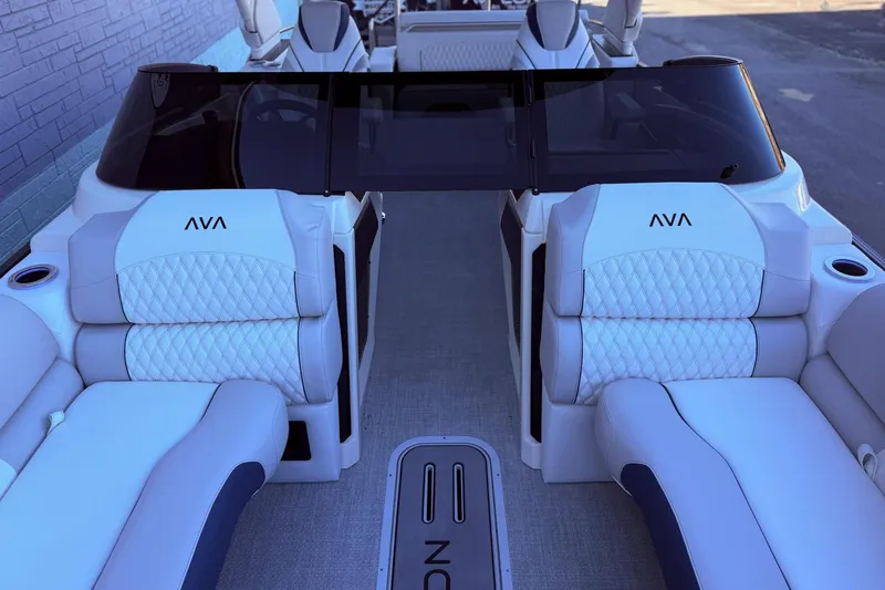 Slide: The Image of Luxurious interior of 2026 Avalon 2585 Excalibur LTD Flex Windshield boat with plush seating. - 8