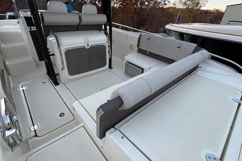 Slide: The Image of 2024 Invictus GT280S boat interior with seating and storage compartments. - 13