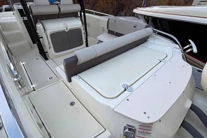 Slide: The Image of 2024 Invictus GT280S boat interior with seating and storage compartments. - 14