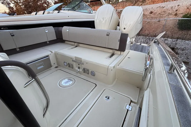 Slide: The Image of 2024 Invictus GT280S boat interior with seating and dual outboard engines. - 4
