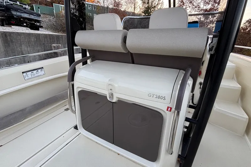 Slide: The Image of 2024 Invictus GT280S boat interior with seating and storage compartments. - 7