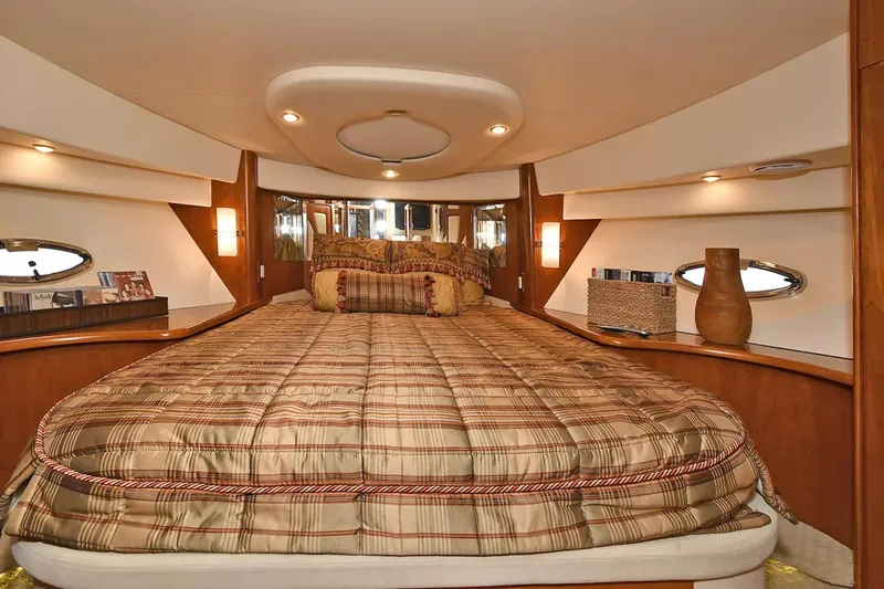 Slide: The Image of Luxurious bedroom interior of 2009 Silverton 52 Ovation yacht with elegant decor. - 13