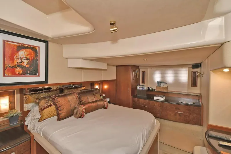 Slide: The Image of Luxurious bedroom interior of 2009 Silverton 52 Ovation yacht with elegant decor and artwork. - 16