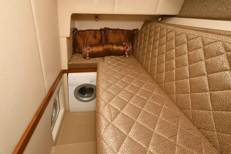 Slide: The Image of Luxurious cabin interior of 2009 Silverton 52 Ovation yacht with elegant seating and built-in washer. - 18