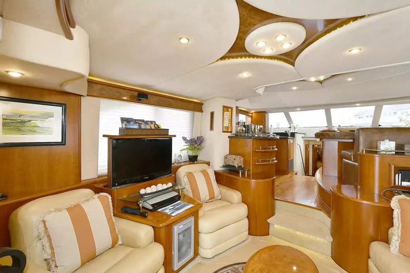 Slide: The Image of Luxurious interior of 2009 Silverton 52 Ovation yacht with elegant seating and modern amenities. - 4