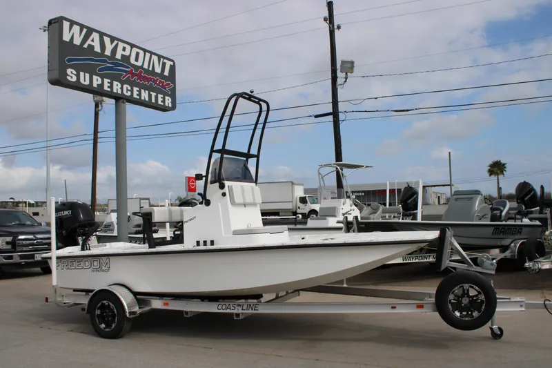 The Image of 2026 Freedom Boats 19 PATRIOT at Waypoint Marine Supercenter, displayed on a trailer. - 0
