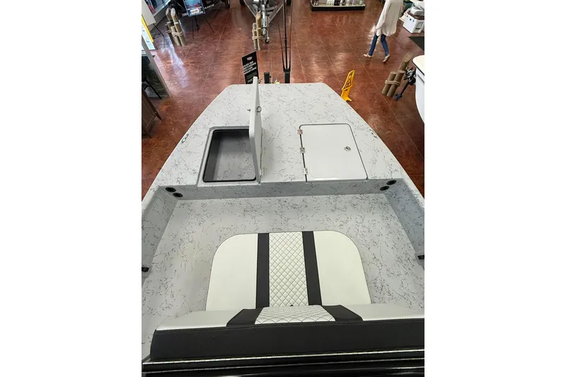 Slide: The Image of 2026 Freedom Boats 19 PATRIOT console with steering wheel and rod holders. - 10