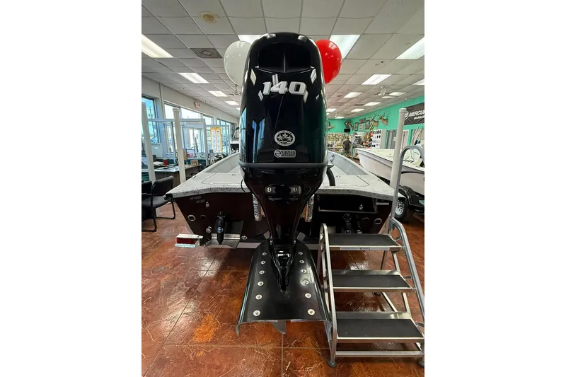 Slide: The Image of 2026 Freedom Boats 19 PATRIOT on trailer at a marine supercenter. - 2